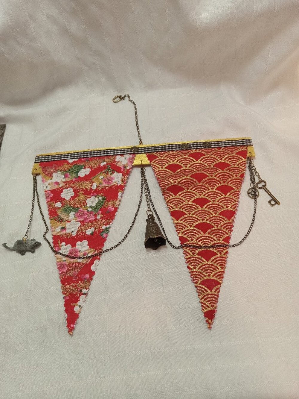 3-A reversible, handmade hanging banner made with fabric, chains, charms & coins